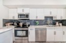 220-7 Westpark Common Sw, Calgary, AB  - Indoor Photo Showing Kitchen With Stainless Steel Kitchen With Double Sink 