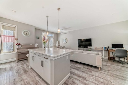 220-7 Westpark Common Sw, Calgary, AB - Indoor Photo Showing Living Room