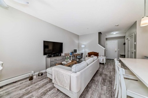 220-7 Westpark Common Sw, Calgary, AB - Indoor Photo Showing Living Room