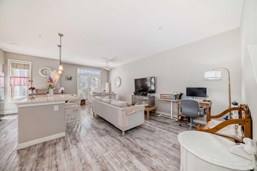 220-7 Westpark Common Sw, Calgary, AB - Indoor Photo Showing Living Room