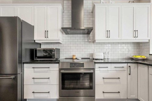 103 Auburn Glen Way Se, Calgary, AB - Indoor Photo Showing Kitchen With Upgraded Kitchen