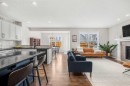 103 Auburn Glen Way Se, Calgary, AB  - Indoor Photo Showing Living Room With Fireplace 