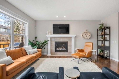 103 Auburn Glen Way Se, Calgary, AB - Indoor Photo Showing Living Room With Fireplace