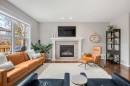103 Auburn Glen Way Se, Calgary, AB  - Indoor Photo Showing Living Room With Fireplace 