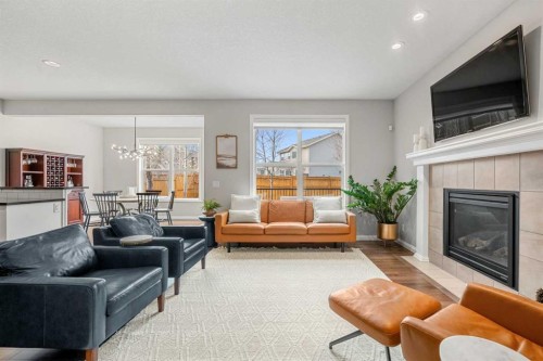 103 Auburn Glen Way Se, Calgary, AB - Indoor Photo Showing Living Room With Fireplace