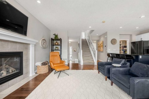 103 Auburn Glen Way Se, Calgary, AB - Indoor Photo Showing Living Room With Fireplace