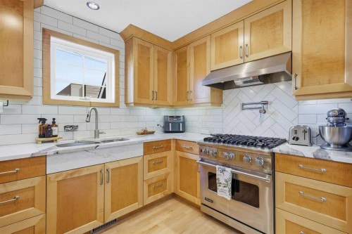 2712 22 Street Sw, Calgary, AB - Indoor Photo Showing Kitchen With Double Sink