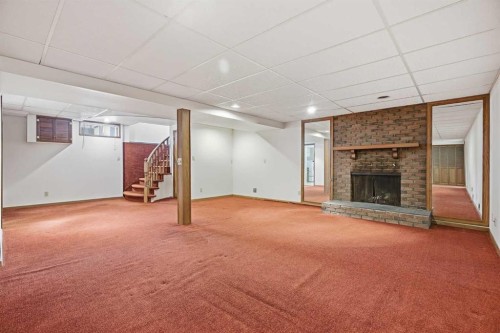 5220 Barron Drive Nw, Calgary, AB - Indoor With Fireplace
