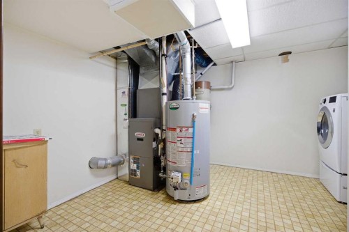 5220 Barron Drive Nw, Calgary, AB - Indoor Photo Showing Laundry Room
