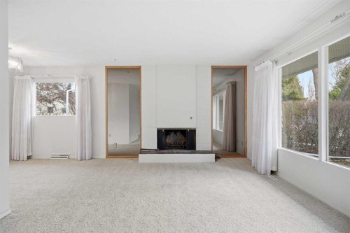 5220 Barron Drive Nw, Calgary, AB - Indoor With Fireplace