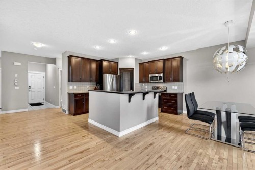 43 Heritage Hill, Cochrane, AB - Indoor Photo Showing Kitchen With Upgraded Kitchen