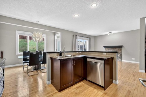 43 Heritage Hill, Cochrane, AB - Indoor Photo Showing Kitchen With Double Sink