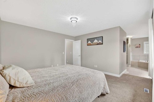 43 Heritage Hill, Cochrane, AB - Indoor Photo Showing Bedroom