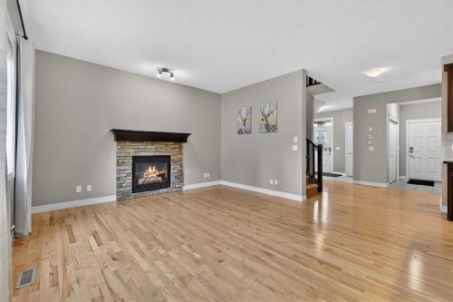 43 Heritage Hill, Cochrane, AB - Indoor Photo Showing Living Room With Fireplace