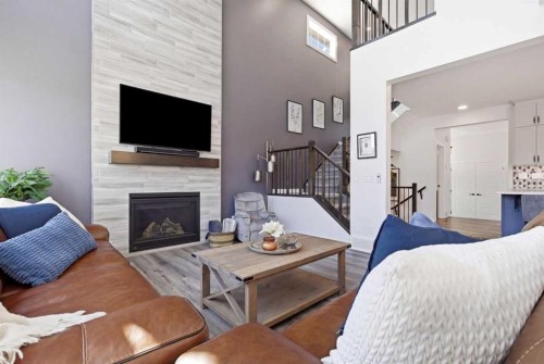 7 Evansglen Park Nw, Calgary, AB - Indoor Photo Showing Living Room With Fireplace