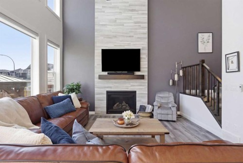 7 Evansglen Park Nw, Calgary, AB - Indoor Photo Showing Living Room With Fireplace
