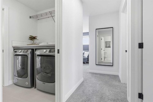 7 Evansglen Park Nw, Calgary, AB - Indoor Photo Showing Laundry Room