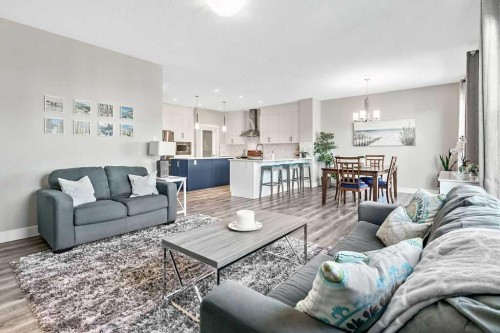 75 Sundown Way, Cochrane, AB - Indoor Photo Showing Living Room
