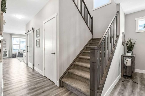 75 Sundown Way, Cochrane, AB - Indoor Photo Showing Other Room