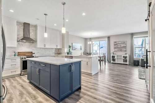 75 Sundown Way, Cochrane, AB - Indoor Photo Showing Kitchen With Upgraded Kitchen