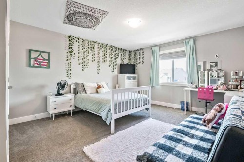 75 Sundown Way, Cochrane, AB - Indoor Photo Showing Bedroom