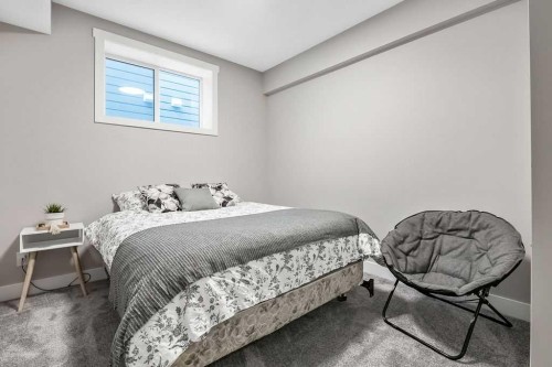 75 Sundown Way, Cochrane, AB - Indoor Photo Showing Bedroom
