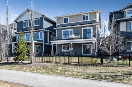 75 Sundown Way, Cochrane, AB - Outdoor With Facade