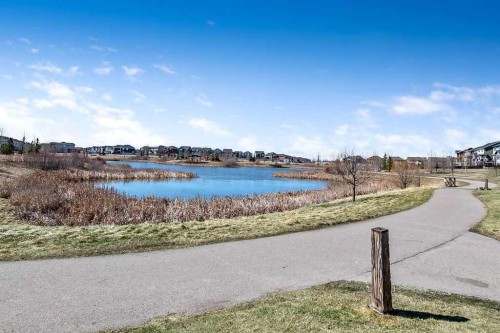 75 Sundown Way, Cochrane, AB - Outdoor With Body Of Water With View
