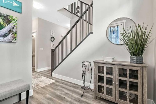 75 Sundown Way, Cochrane, AB - Indoor Photo Showing Other Room