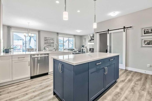 75 Sundown Way, Cochrane, AB - Indoor Photo Showing Kitchen With Upgraded Kitchen