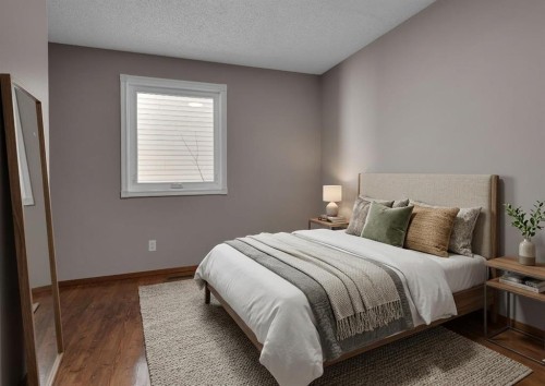 260 Hawkwood Boulevard Nw, Calgary, AB - Indoor Photo Showing Bedroom
