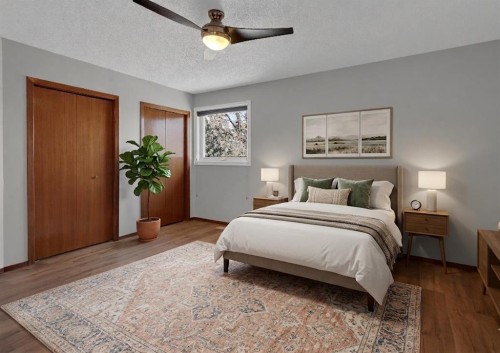 260 Hawkwood Boulevard Nw, Calgary, AB - Indoor Photo Showing Bedroom
