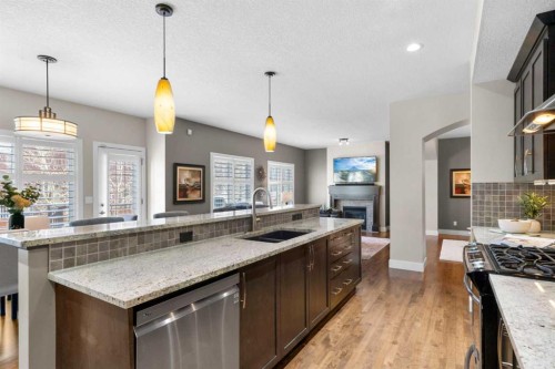 809 Canoe Green Sw, Airdrie, AB - Indoor Photo Showing Kitchen With Upgraded Kitchen