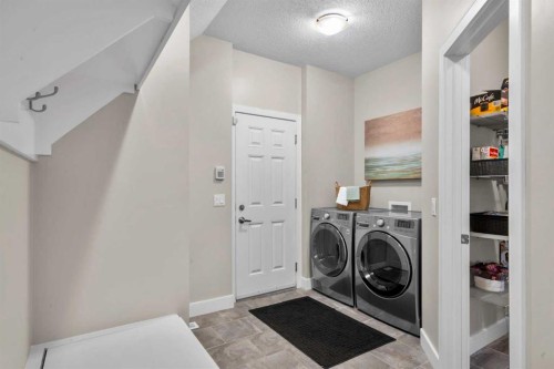809 Canoe Green Sw, Airdrie, AB - Indoor Photo Showing Laundry Room