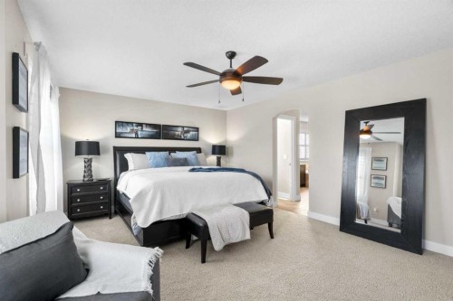 809 Canoe Green Sw, Airdrie, AB - Indoor Photo Showing Bedroom