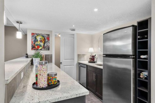 809 Canoe Green Sw, Airdrie, AB - Indoor Photo Showing Kitchen With Upgraded Kitchen