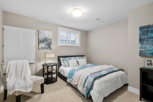 809 Canoe Green Sw, Airdrie, AB - Indoor Photo Showing Bedroom
