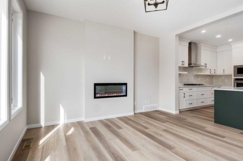26 Alpine Gardens Sw, Calgary, AB - Indoor With Fireplace