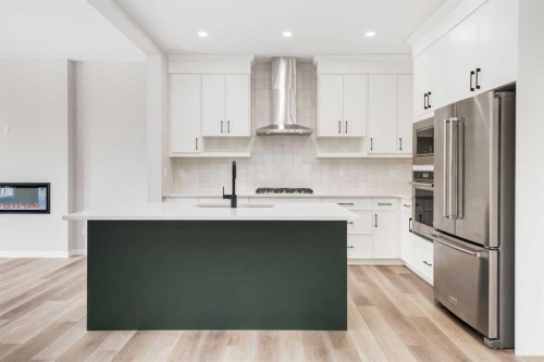 26 Alpine Gardens Sw, Calgary, AB - Indoor Photo Showing Kitchen With Upgraded Kitchen