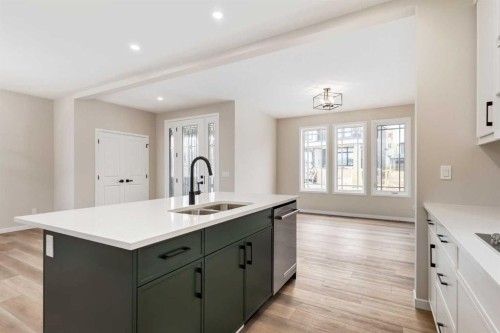 26 Alpine Gardens Sw, Calgary, AB - Indoor Photo Showing Kitchen With Double Sink With Upgraded Kitchen