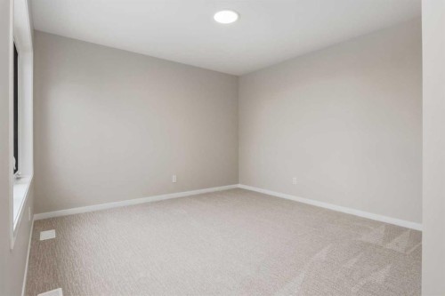 26 Alpine Gardens Sw, Calgary, AB - Indoor Photo Showing Other Room