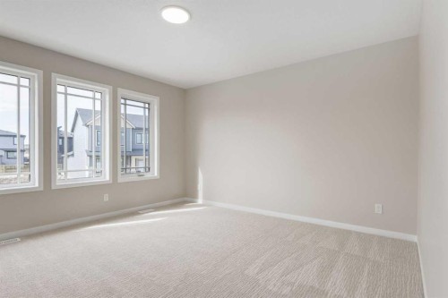 26 Alpine Gardens Sw, Calgary, AB - Indoor Photo Showing Other Room