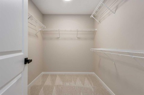 26 Alpine Gardens Sw, Calgary, AB - Indoor With Storage