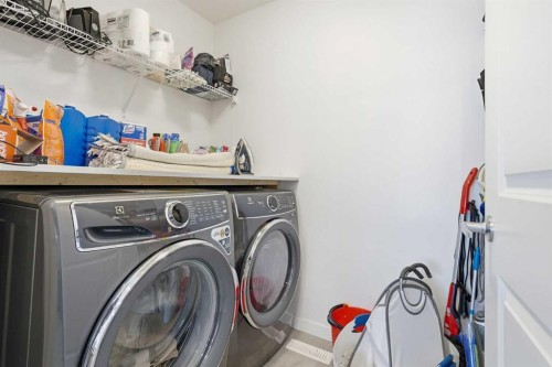 260 Lucas Way Nw, Calgary, AB - Indoor Photo Showing Laundry Room