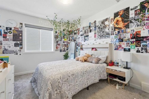 260 Lucas Way Nw, Calgary, AB - Indoor Photo Showing Bedroom
