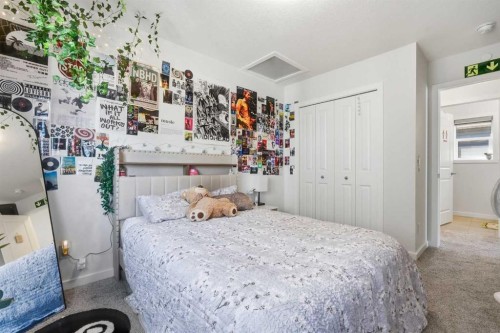 260 Lucas Way Nw, Calgary, AB - Indoor Photo Showing Bedroom