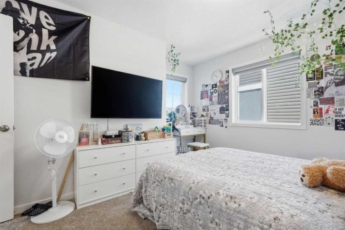 260 Lucas Way Nw, Calgary, AB - Indoor Photo Showing Bedroom