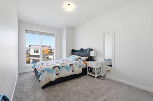260 Lucas Way Nw, Calgary, AB - Indoor Photo Showing Bedroom