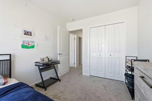 260 Lucas Way Nw, Calgary, AB - Indoor Photo Showing Bedroom