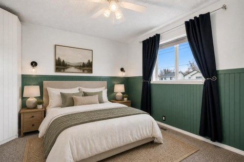 14700 Mt Mckenzie Drive Se, Calgary, AB - Indoor Photo Showing Bedroom